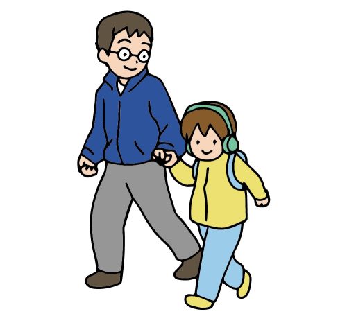 音の過敏性がある子どもがイヤーマフを装着して、教員と手をつなぎ登校