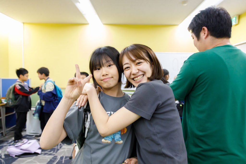 チーム花メンの1人、リノさんと子どもたち。