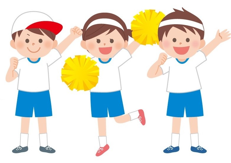 運動会で白組も応援をする子供たち。