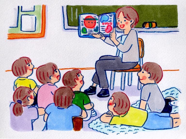 読み聞かせをする先生