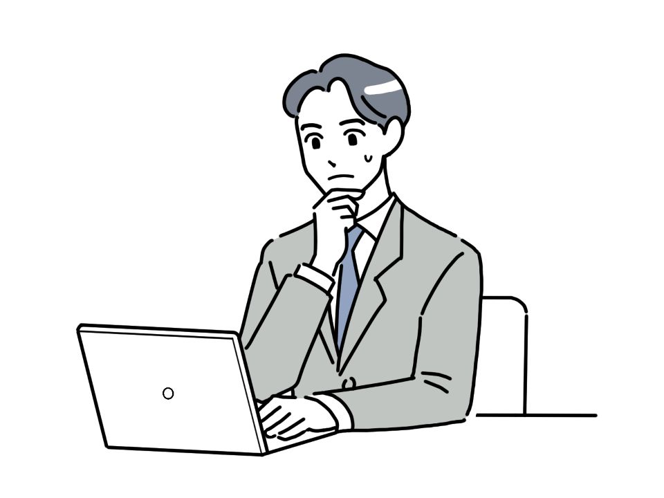 通知表の所見文の作成に苦心する教師