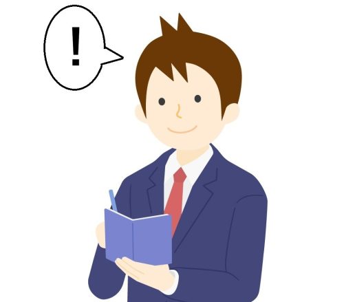 授業中に気づいたことをメモを取る男性教師