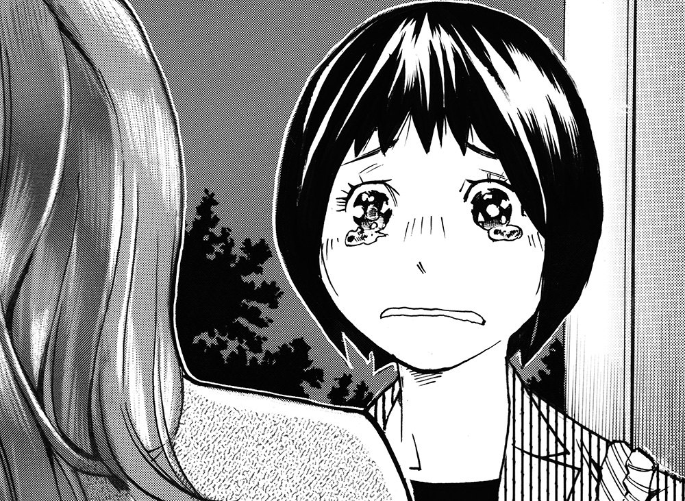 母親の言葉に涙ぐむまどか。